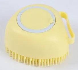 Silicone dog bath brush in blue, pink, and yellow colours, compact 9x6x8.5cm grooming tool