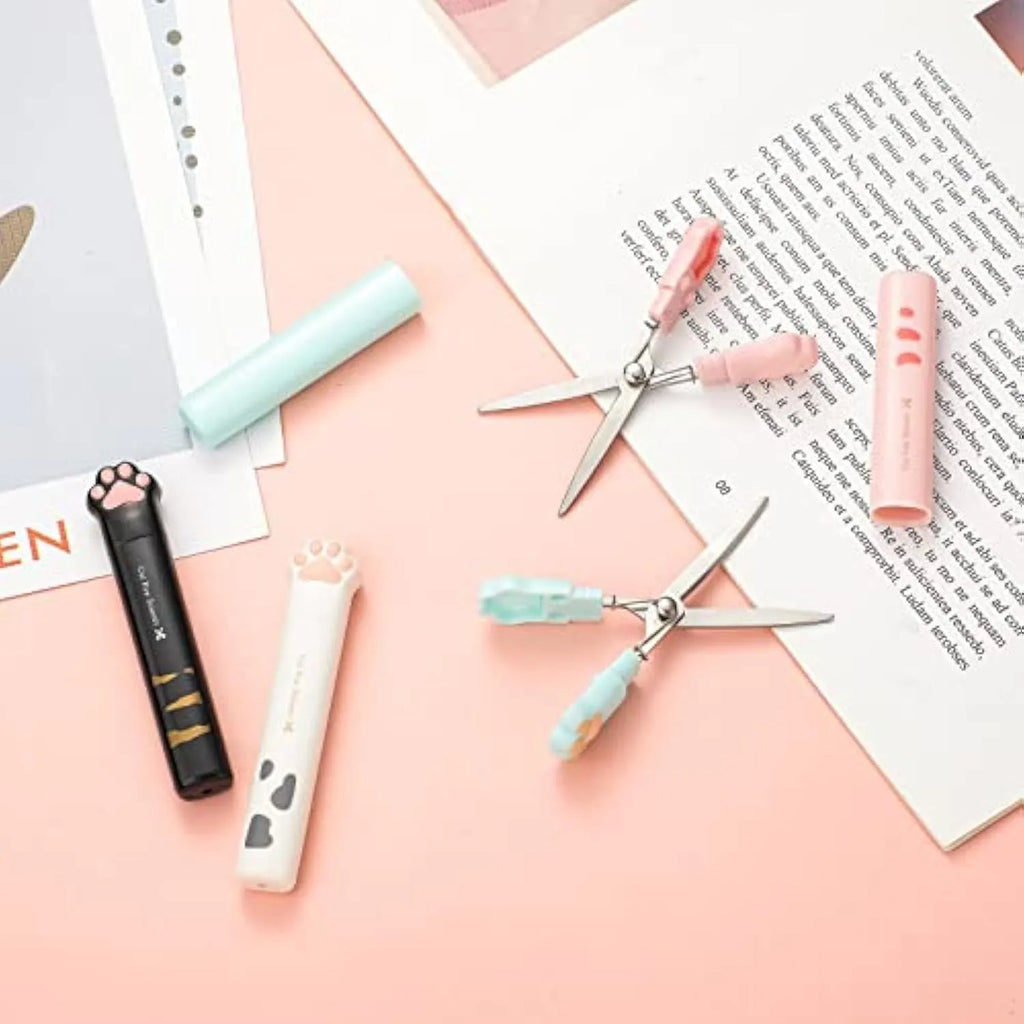 Cat paw mini folding safety scissors showing folded position with stainless steel blades and decorative handle