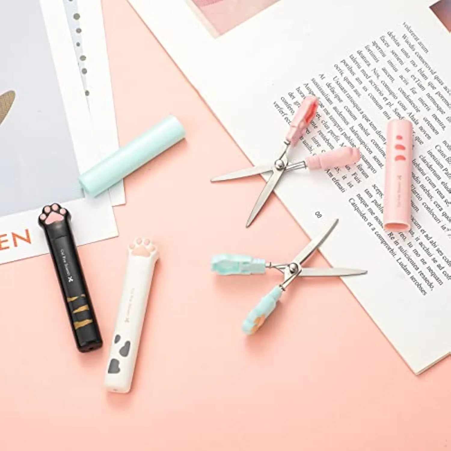 Cat paw mini folding safety scissors showing folded position with stainless steel blades and decorative handle