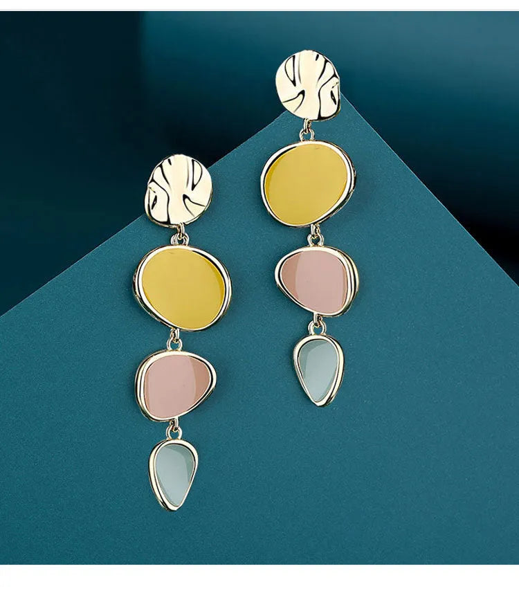 Morandi three-colour oil drip pattern on wafer-thin alloy disc earrings with sterling silver needles.