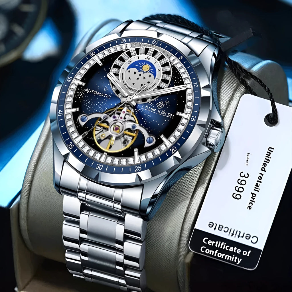 Men's silver automatic mechanical watch with blue dial and stainless steel bracelet on wrist