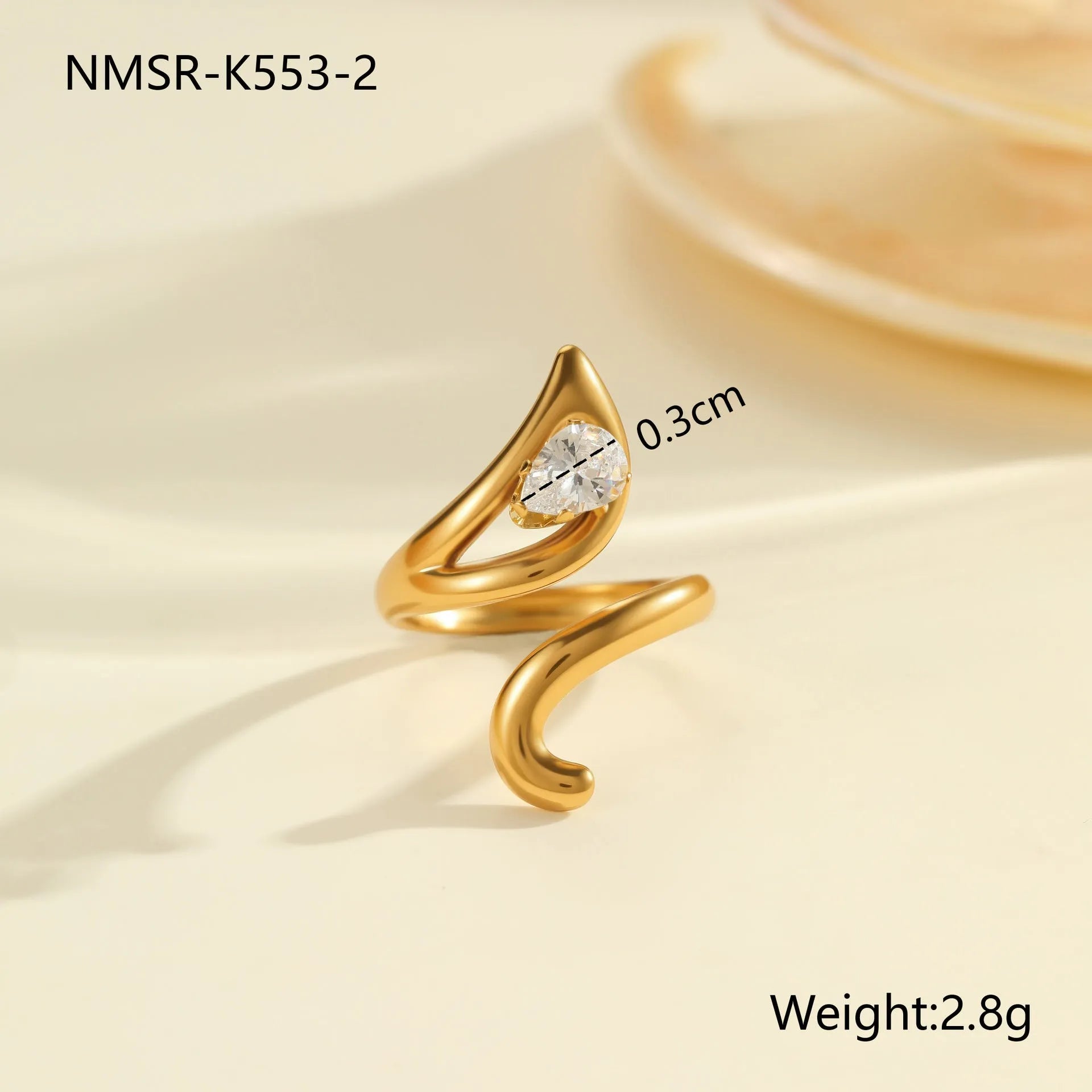 Adjustable geometric zircon ring in stainless steel with electroplated finish showing open-mouth design