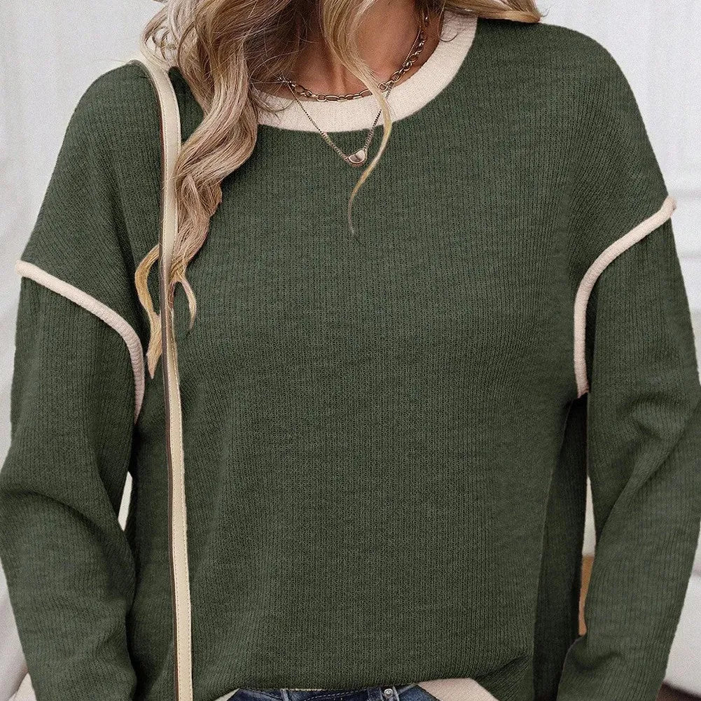 Women's loose knit top with drop shoulders and four leaf clover contrast colour trim