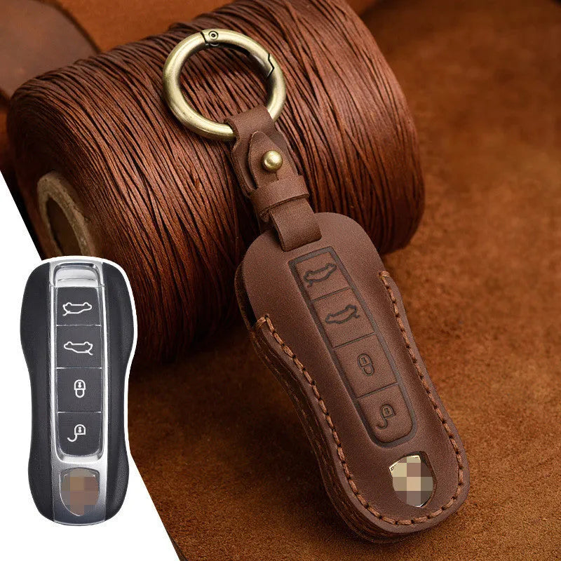 Authentic brown cowhide leather Porsche key cover with a retro metal bag buckle closure.
