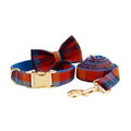 Blue velvet plaid dog collar and hand-holding rope set with bow on a blue background showing sizes XS to XL