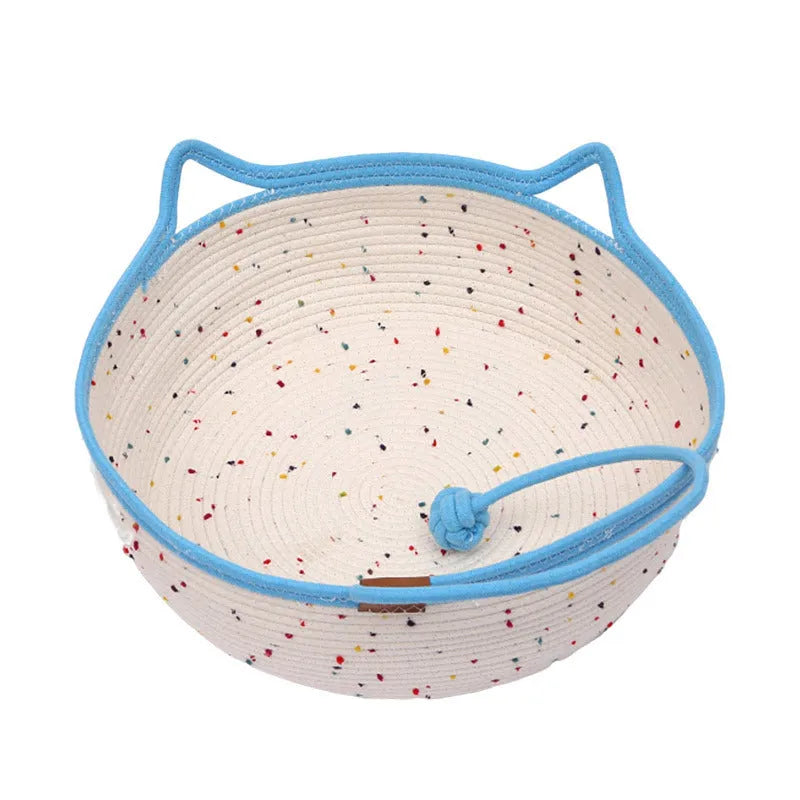 Cotton and hemp rope cat nest mat in large size with dangling toy ball, placed inside a cage