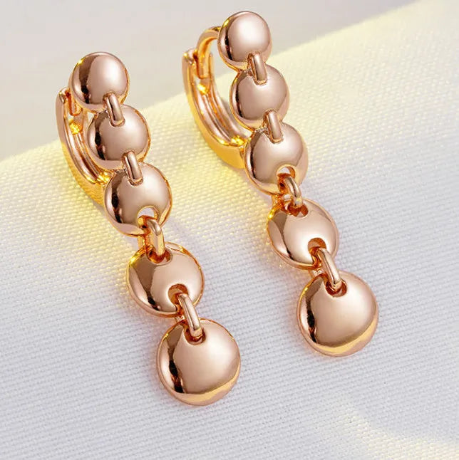 Retro long round circle earrings in woven copper with gold finish