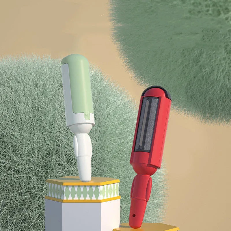 Pet hair remover roller with self-cleaning base, white and green, on a couch