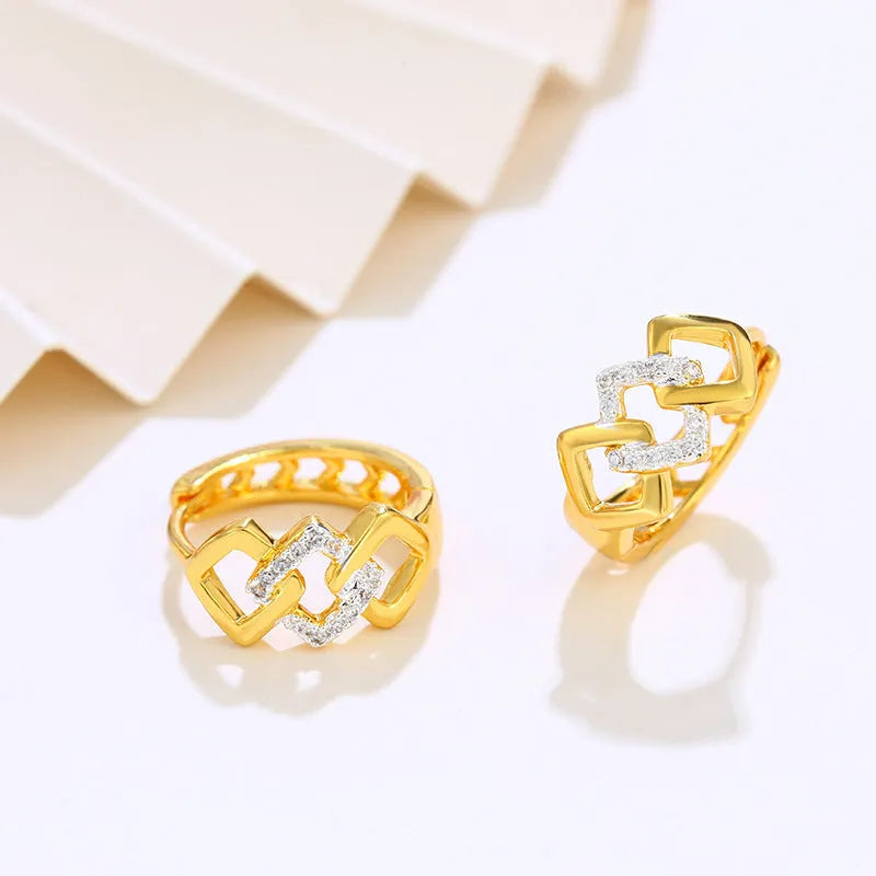 Geometric hollow-out alloy earrings with electroplated colour separation and clip fastening