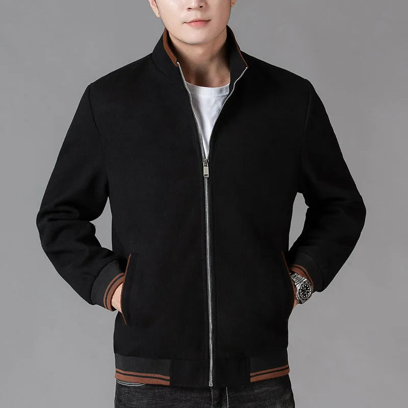 Men's grey wool fleece autumn jacket with long sleeves and a stick pocket, laid flat.