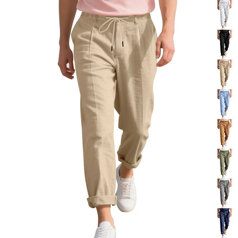 Men's light grey linen casual trousers with a loose straight leg and drawstring waist