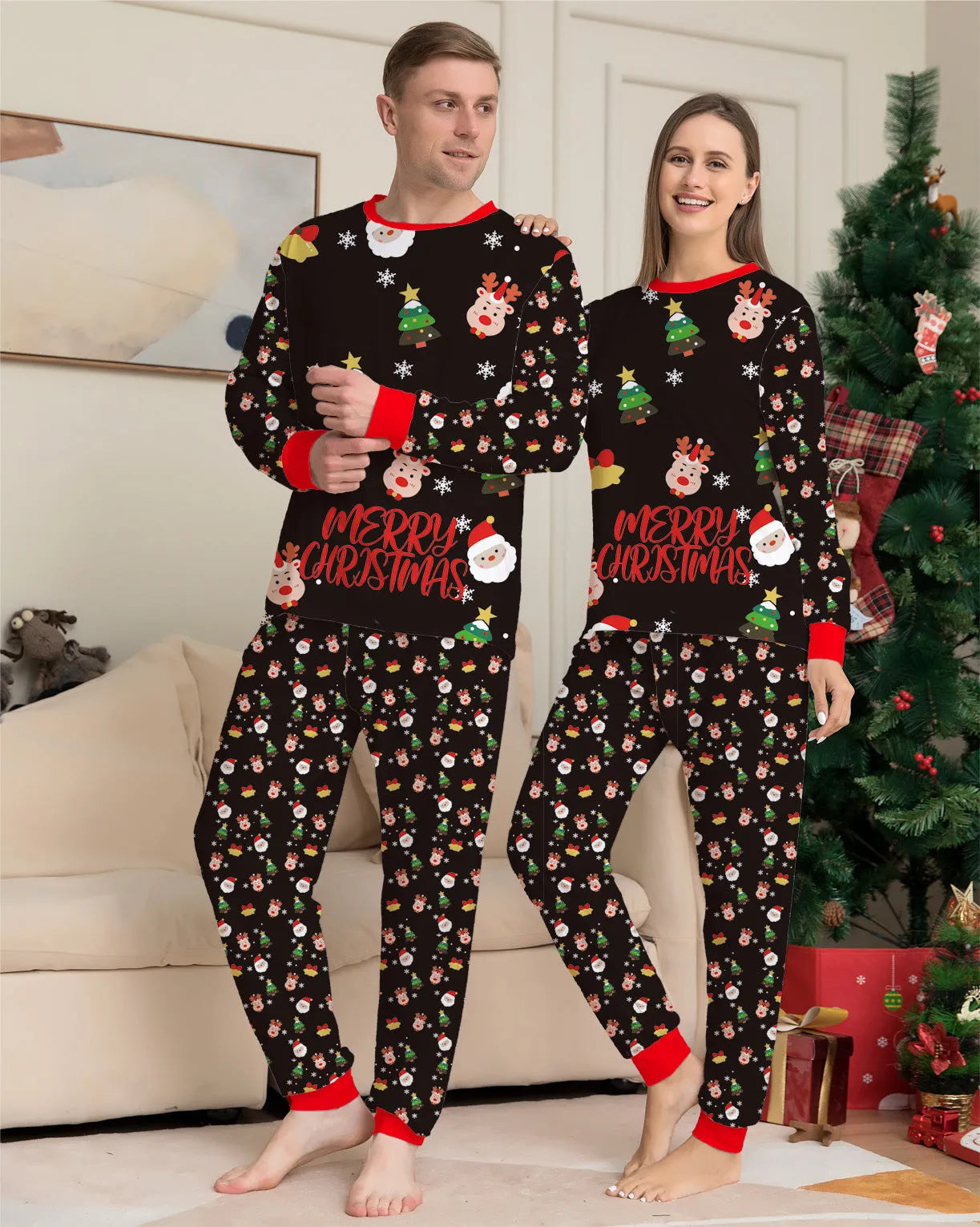 Family wearing matching red plaid Christmas pyjamas, including parents, children, baby, and dog.