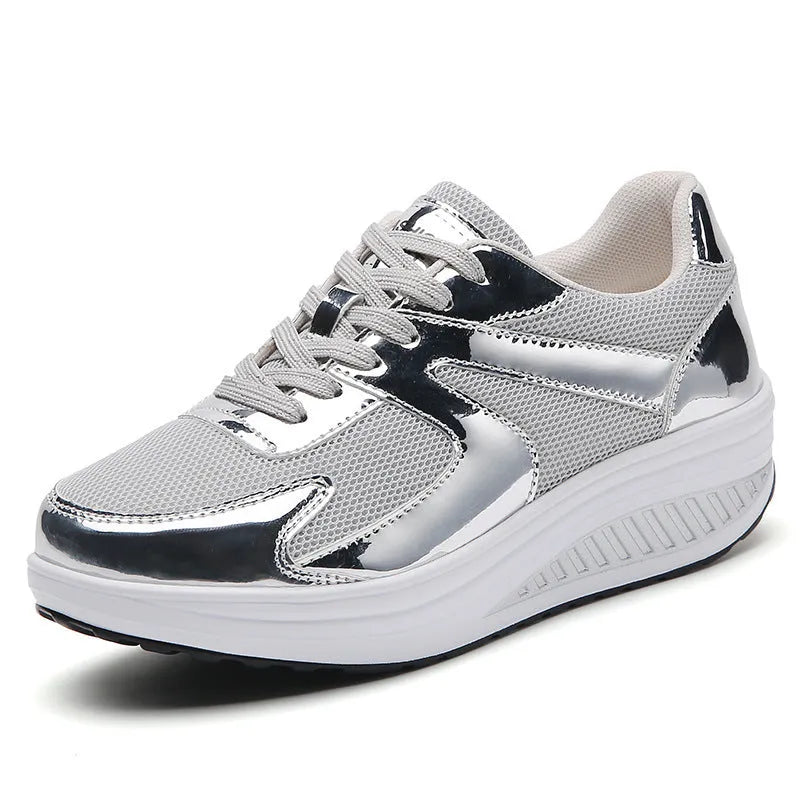 Women's gold breathable mesh elevator sneakers with thick platform sole, cross strap, and round toe