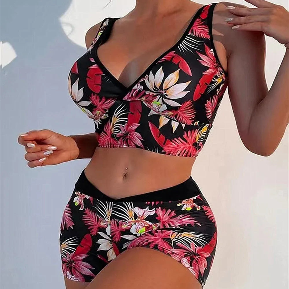 Women's two-piece swimsuit set with sleeveless top and printed boxer shorts in multiple colours.