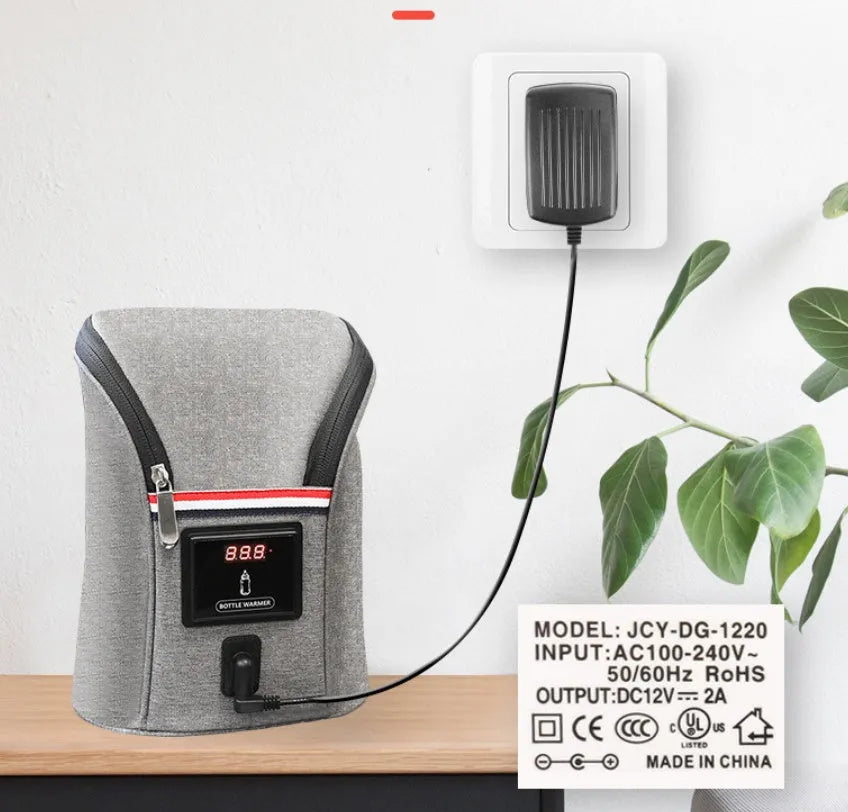 Grey Oxford cloth portable car USB baby bottle warmer showing electronic temperature display and hanging buckle.
