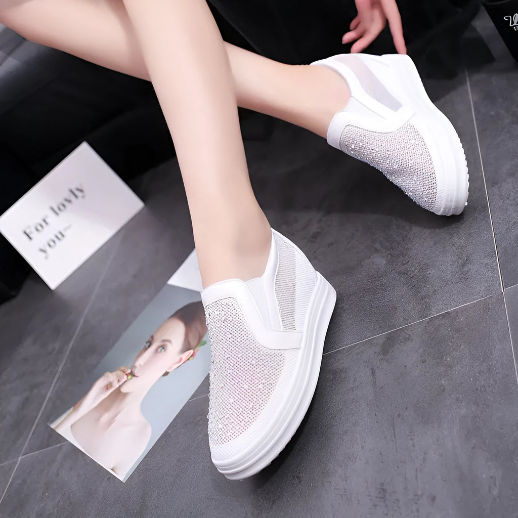 Women's breathable wedge slip-on shoes in black with mesh upper and rubber sole