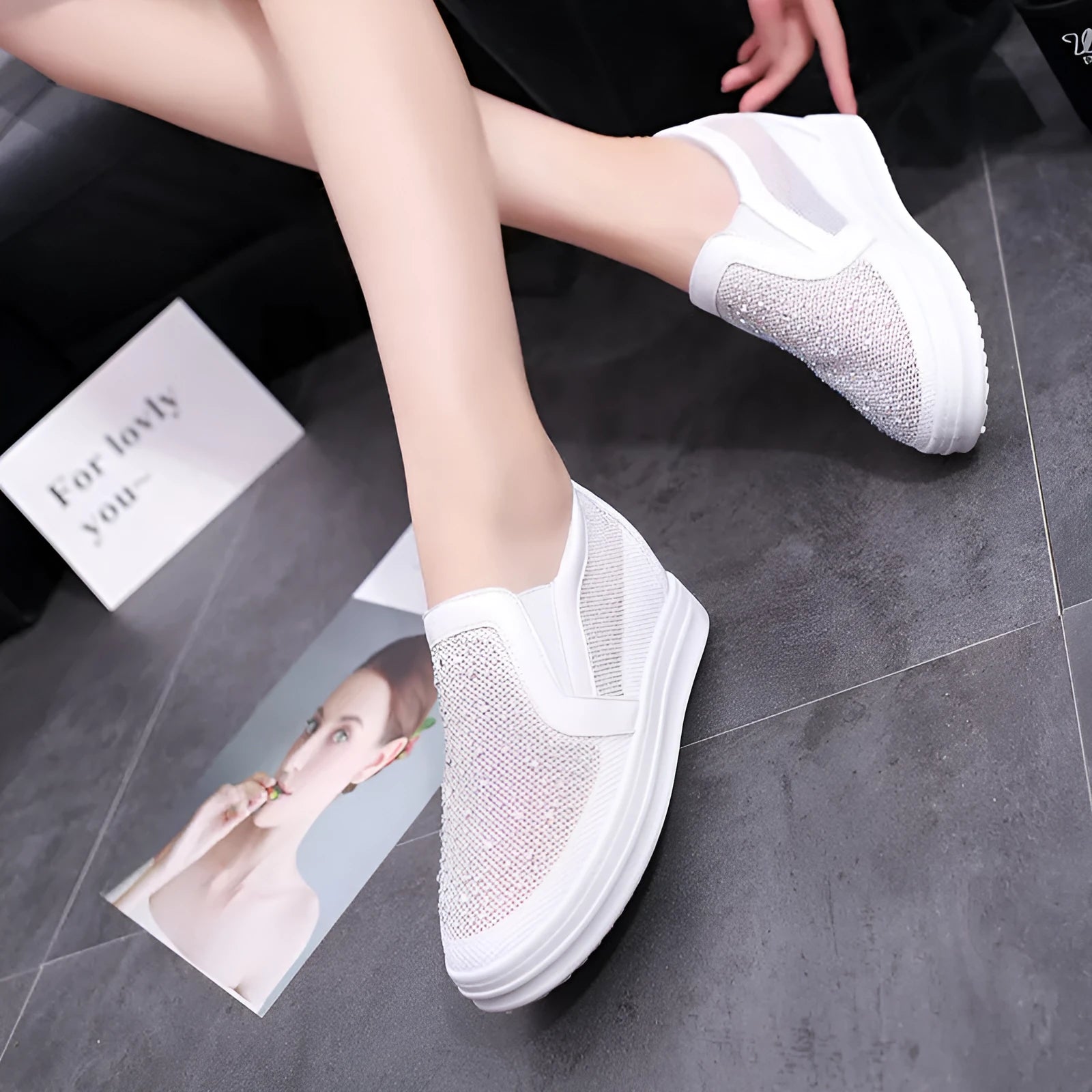 Women's breathable wedge slip-on shoes in black with mesh upper and rubber sole