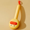Small yellow duck pet grooming comb with fine needles and open section hair collection design