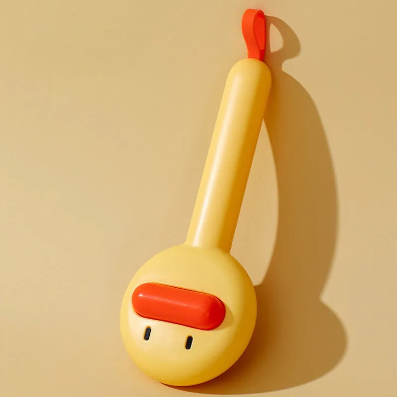 Small yellow duck pet grooming comb with fine needles and open section hair collection design