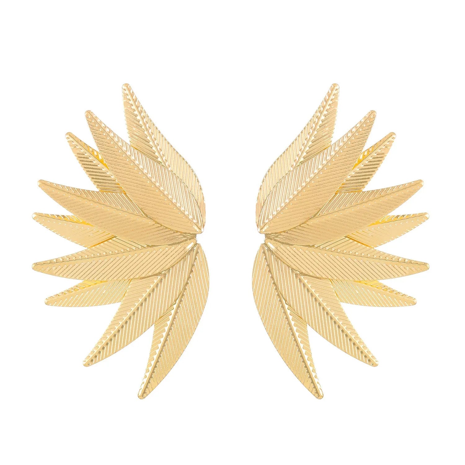 Gold and white leaf-shaped patch earrings made of alloy metal on a neutral background