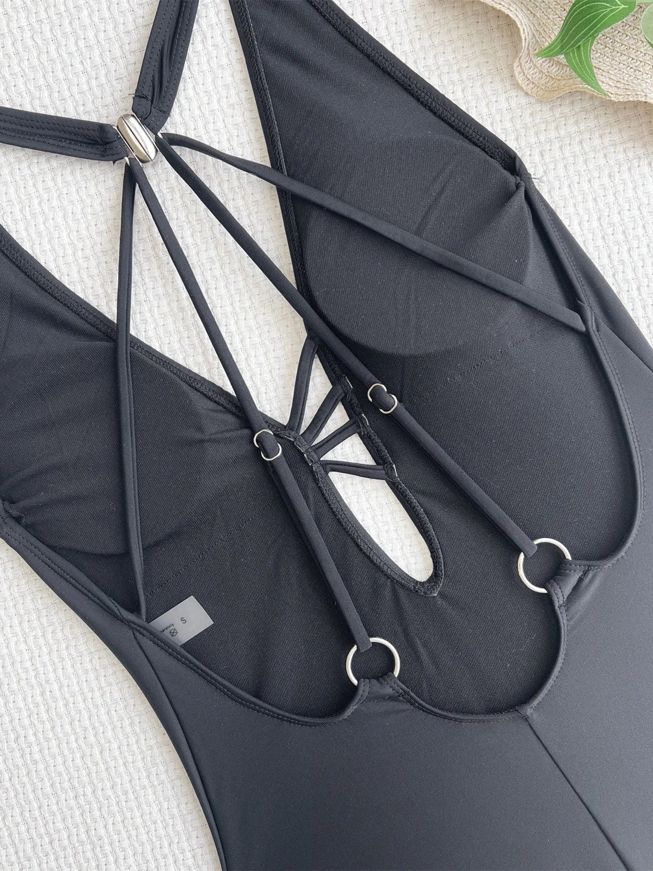 Black one-piece ladies swimsuit in nylon fabric for swimming