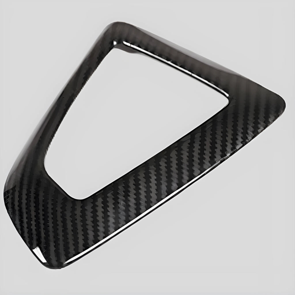 BMW gear base frame in carbon fibre pattern with titanium finish, 13x9cm, left-side fitment