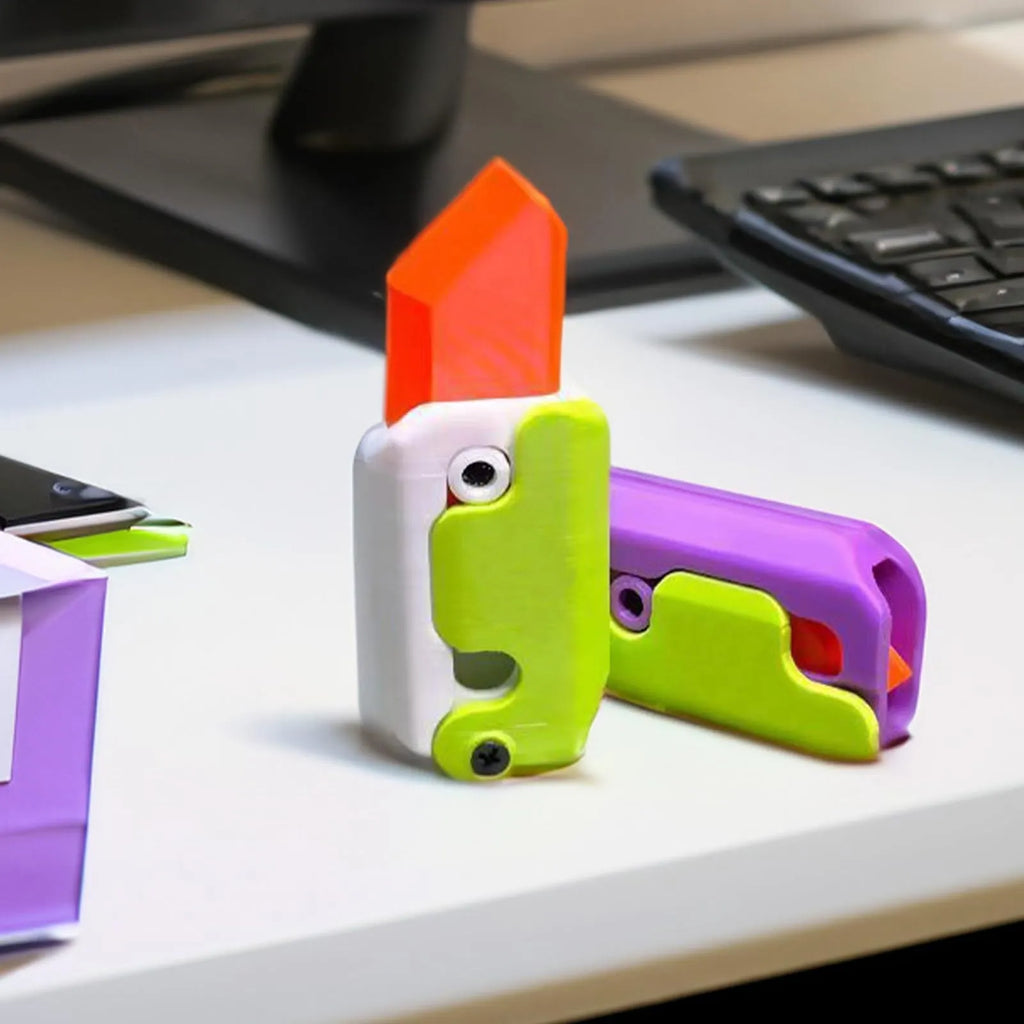3D printed gravity carrot fidget knife in orange, purple and green colour on white background