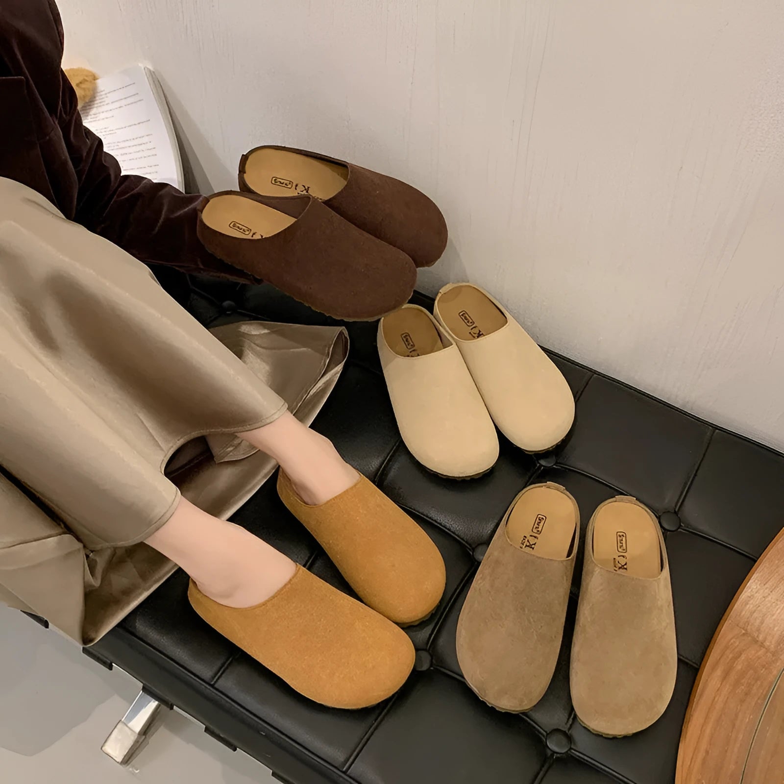 Pair of ugly soft flat Korean style slippers with square toe, shown in apricot colour.