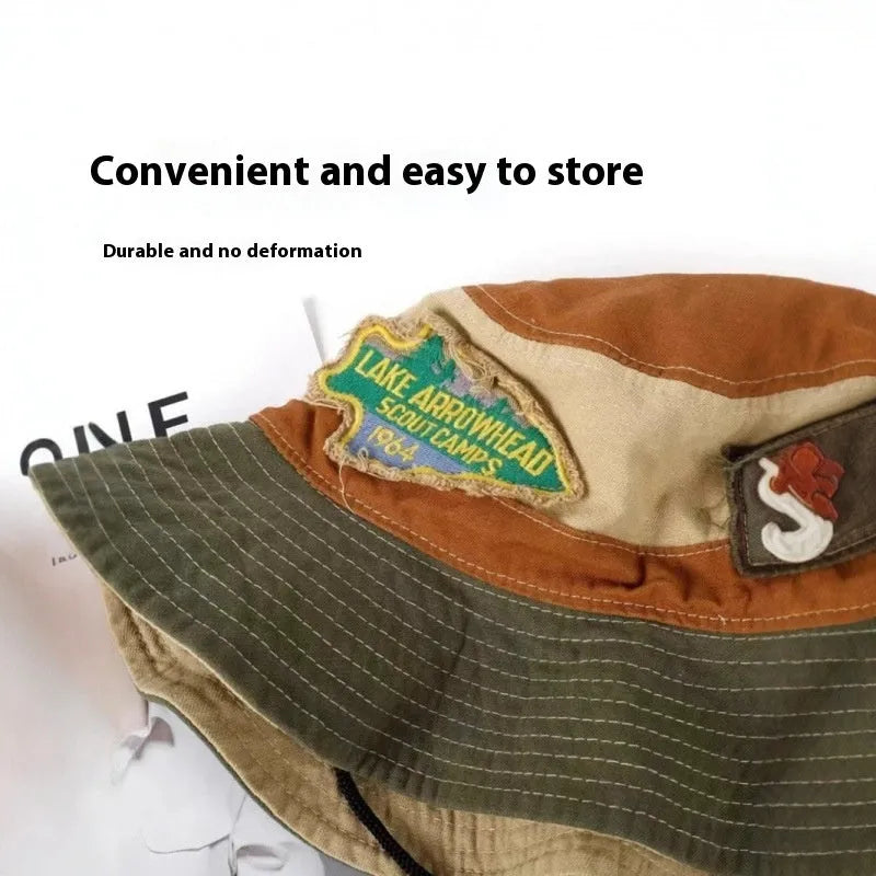 Army green cotton fisherman hat with patchwork fabric and flat top crown design