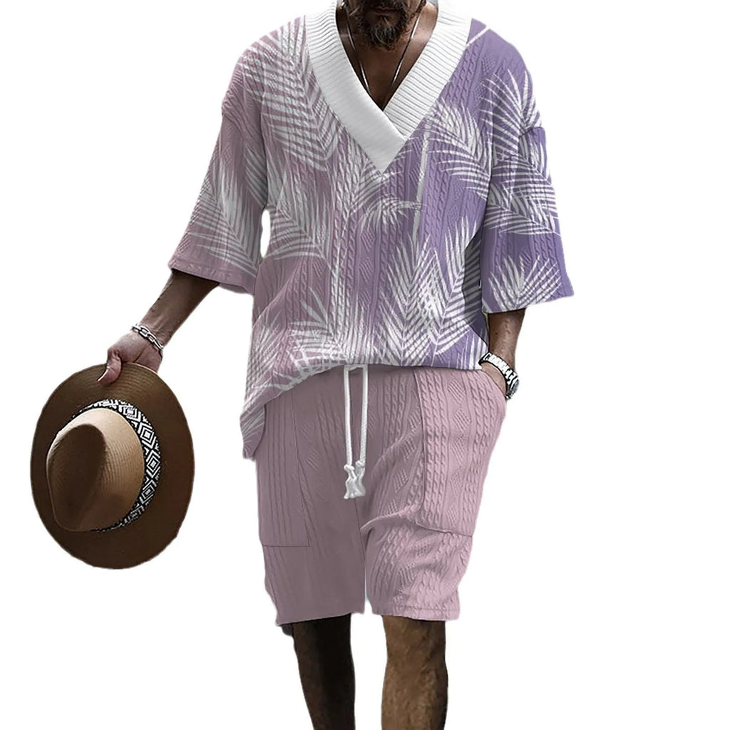 Men's printed drop-shoulder knitted short-sleeve top and matching shorts set on a hanger.