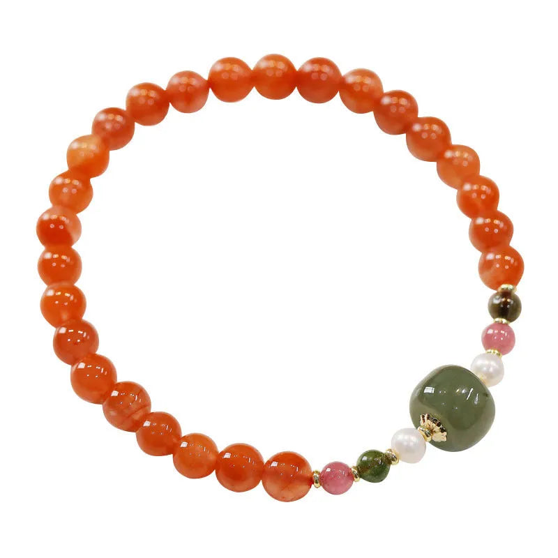 Natural Sichuan south red agate bracelet round bead retro women's jewellery on light background