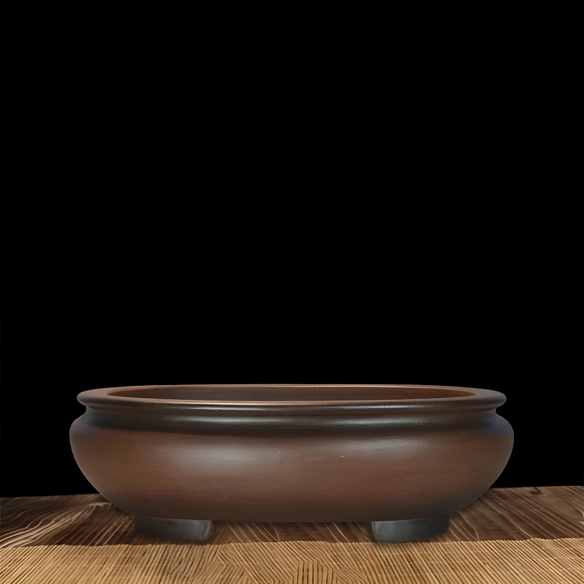 Handmade classical purple clay flowerpot for indoor desktop use.