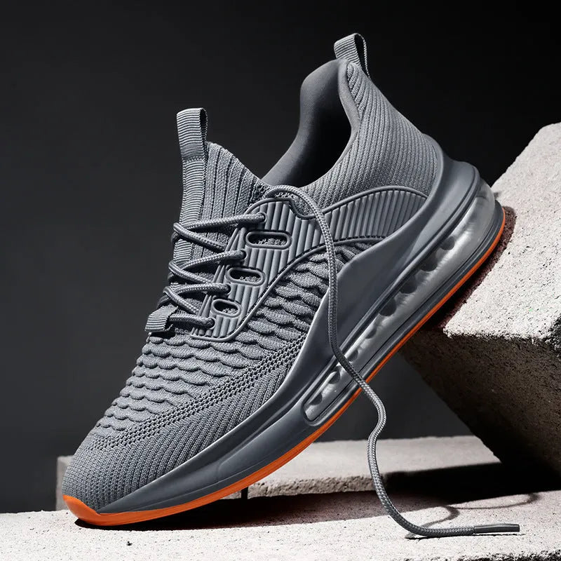 Men's low-top mesh running shoes in black, featuring round toe and lace-up front.