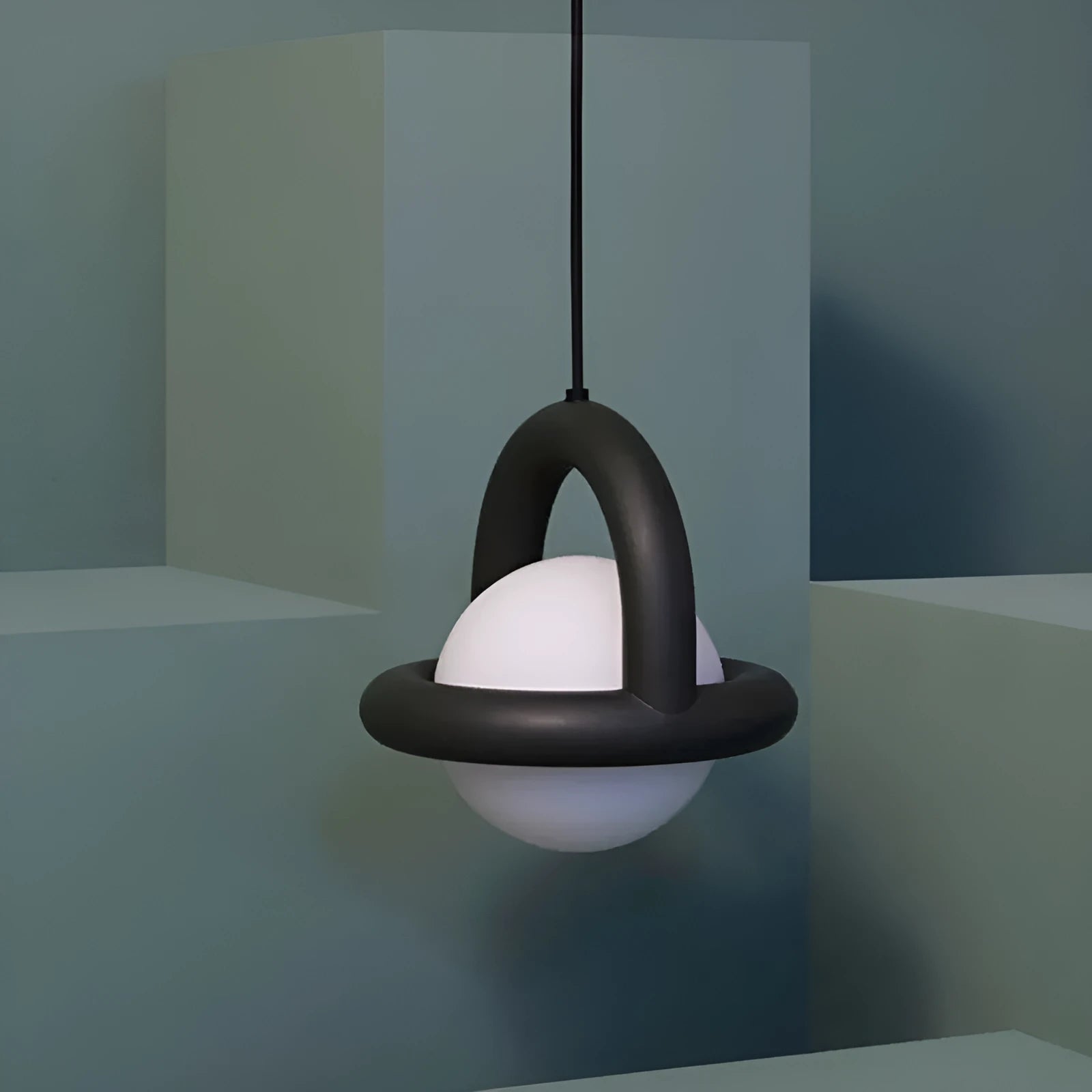 Modern Danish designer pendant lamp with adjustable cord in matte finish hanging above bedside