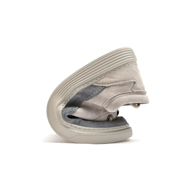 Men's grey casual leather skate shoes with lace-up front and rubber sole