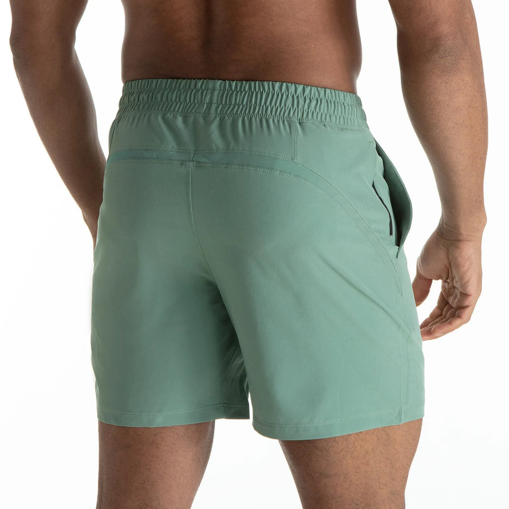 Men's exercise mesh stitching casual quick-drying shorts in black, red, and blue, for running and gym