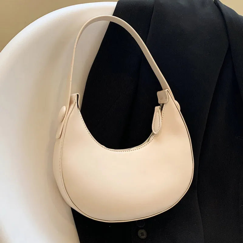 Retro women's shoulder bag in dumpling shape with zip compartment in black, white, cream yellow or brown