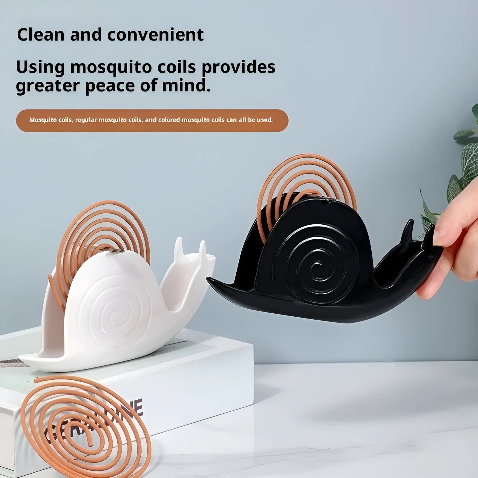 Plastic mosquito incense holder in black creative animal style on a table