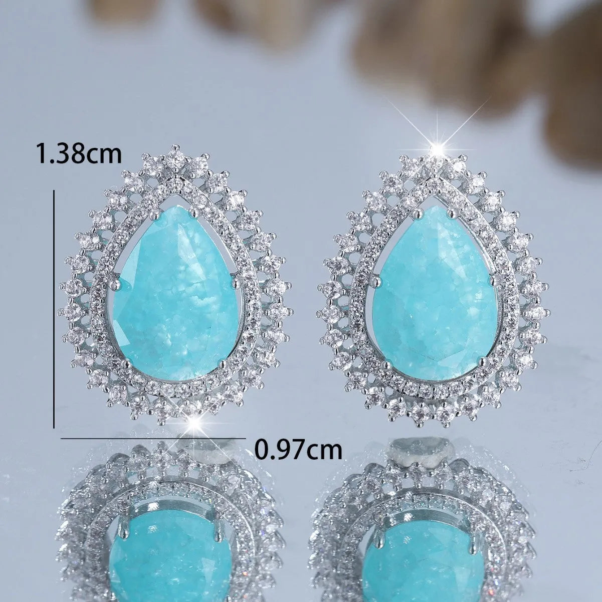 Pair of copper heart shape water drop ice flower earrings with electroplated platinum finish for women