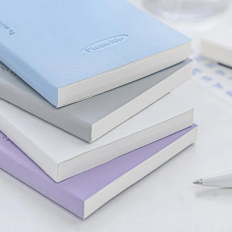 Embossed cover notebook showing 80 sheets of 100g white cow paper with perfect binding