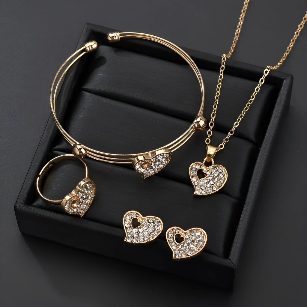 Gold electroplated alloy jewellery set showing earrings, pendant decoration, and hand decoration accessories