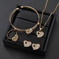Gold electroplated alloy jewellery set showing earrings, pendant decoration, and hand decoration accessories