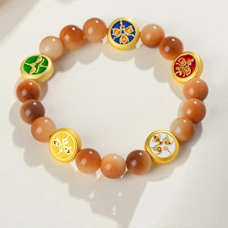 Handmade bodhi seed bracelet with yellow round beads in geometric five-directions design