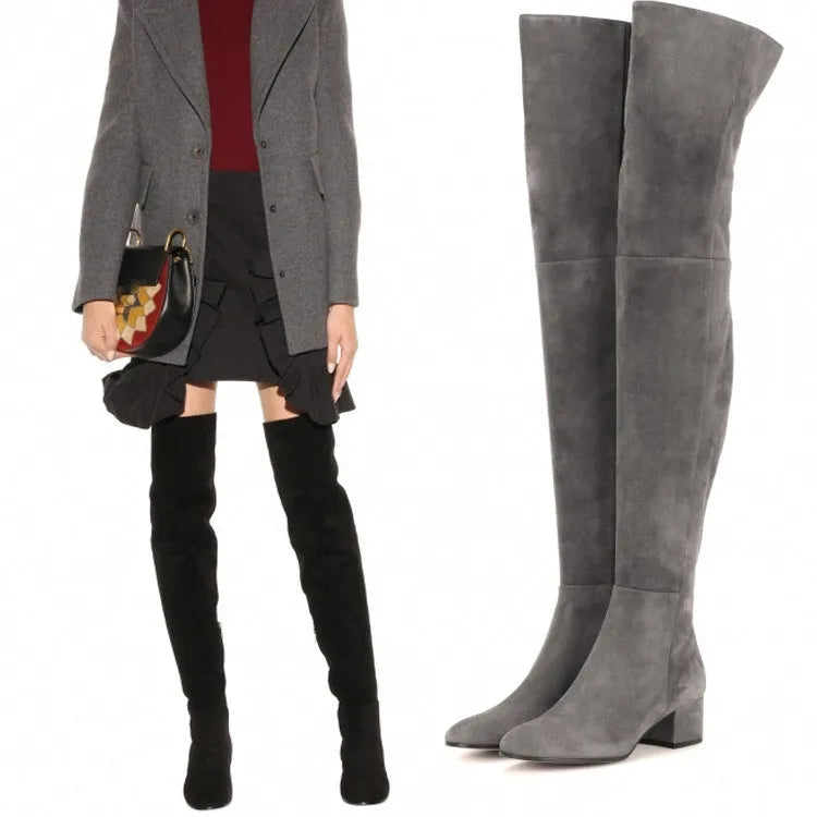 Grey suede women's over the knee flat boots with a pointed toe and low thick heel