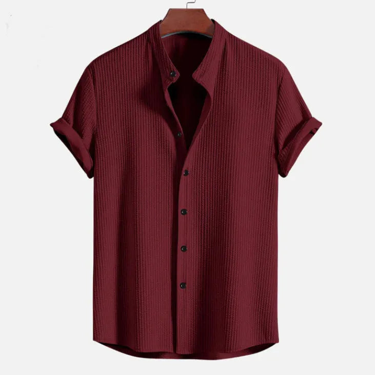 Men's loose short sleeve summer shirt in polyester available in multiple colours.