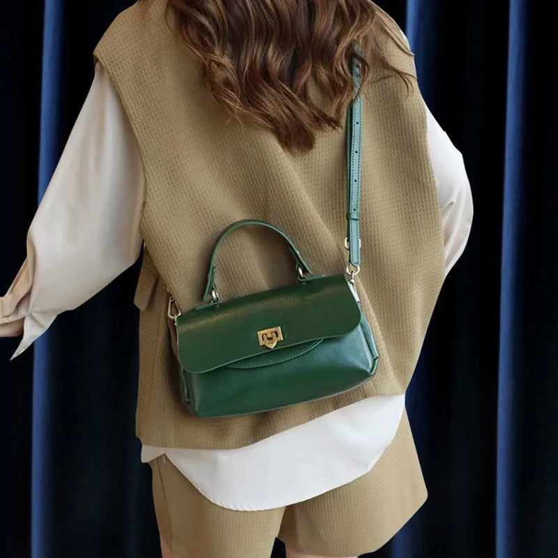 Women's retro genuine leather handbag in saddle shape, first layer cowhide, five colours including dark brown and black