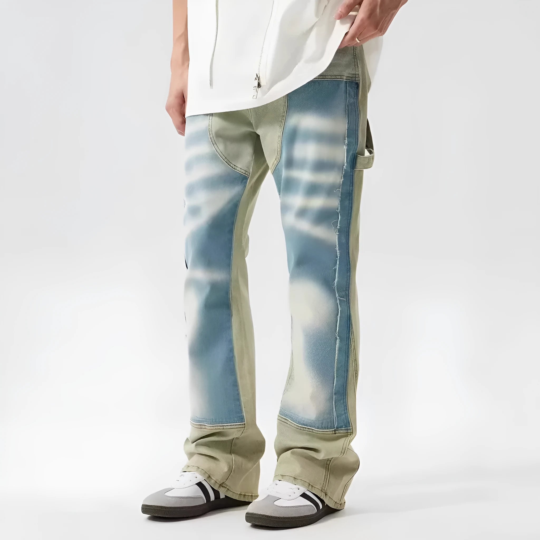 Retro dual-colour yellow and blue patchwork jeans with splash-ink damaged design, mid-waist cut