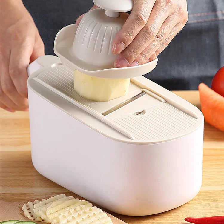 Multifunctional vegetable cutter with stainless steel blades in blue colour, Nordic design