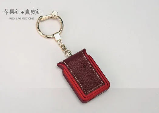 Bluetooth dual SIM adapter keychain with Nano SIM slot and leather finish, compatible with iOS devices