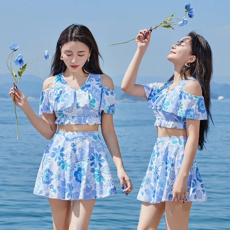 Women's one-piece floral swimsuit in fresh small floral blue, polyester fabric, sizes M-XXL